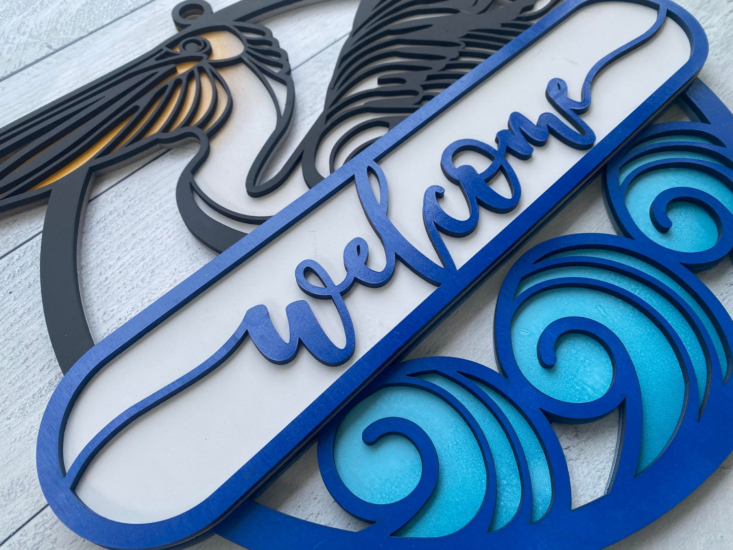 Pelican door hanger